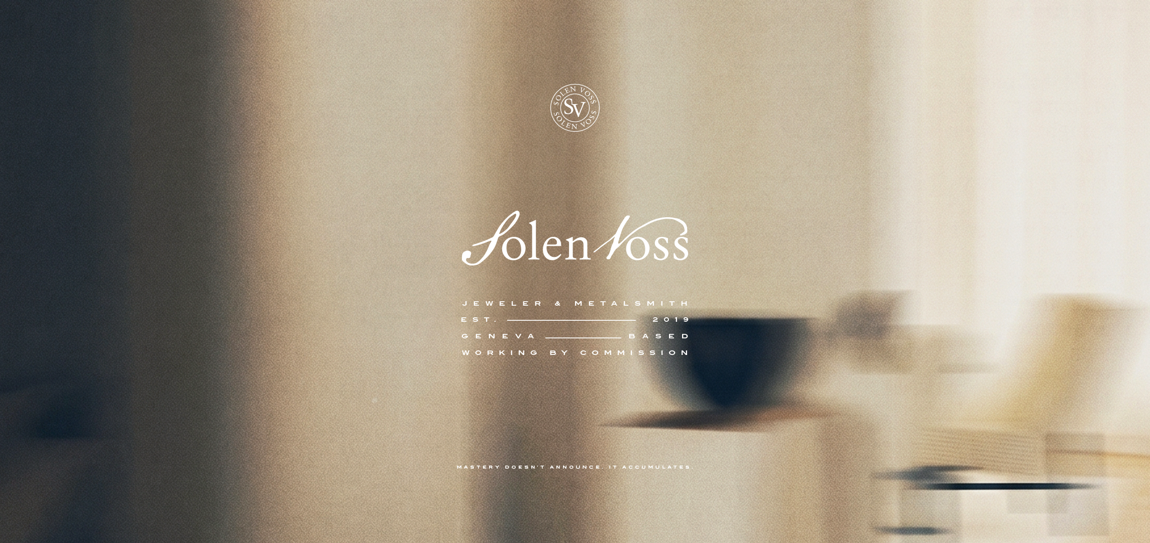 Solen Voss wordmark in white over a warm interior